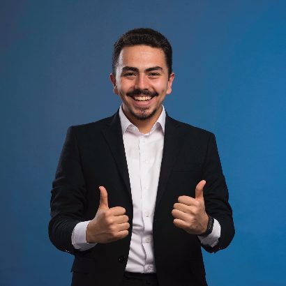 businessman-black-suit-makes-thumb-up-sign