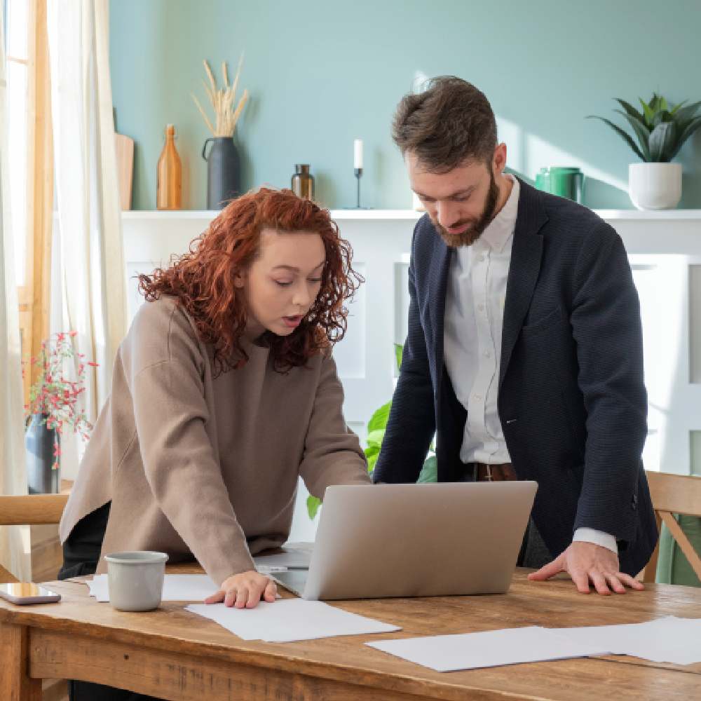 people-having-debate-while-looking-computer